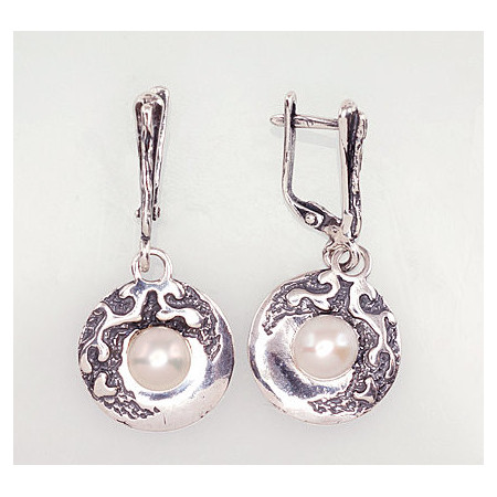 Sidabriniai auskarai ant...